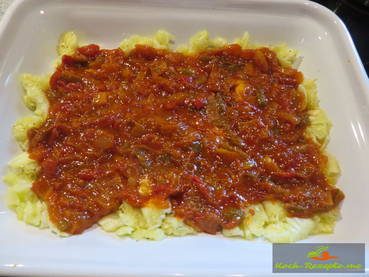 gefüllte Zucchini überbacken Rezept mit französischer Bratwurst.